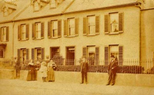 The Malzard family outside their home in Rouge Bouillon
