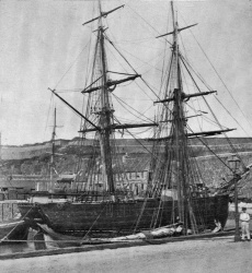 A ship moored on Victoria Pier in the 1860s, with La Folie Inn in the background