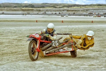 A UK competitor in the motor cycle and side car race in 1976