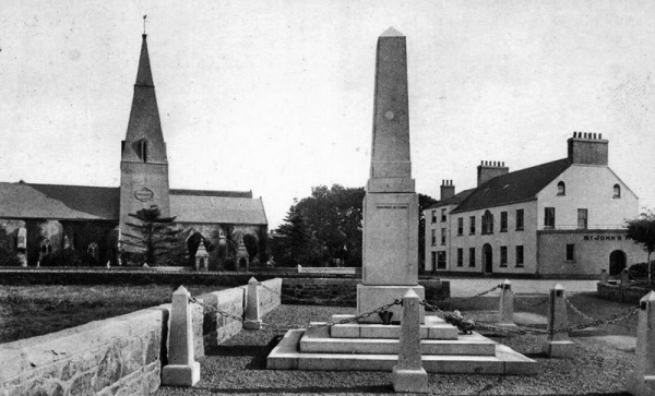 The parish church and St John's Hotel behind the war memorial