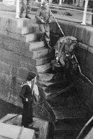 A German officer escorted into captivity