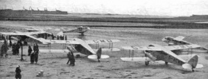 Six DH Dragons on the beach at Easter 1936