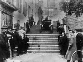 An early car demonstrates its power by climbing the steps from Snowhill to Regent Road ...