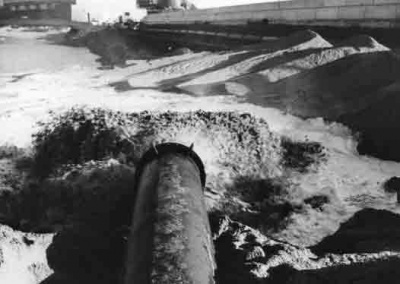 February 1977 and sand is pumped into the site