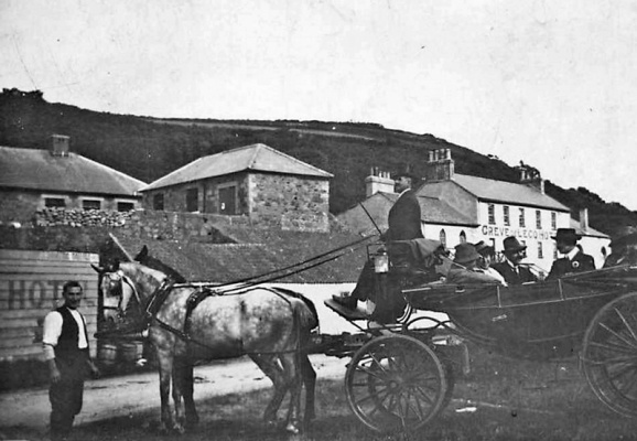 A carriage arrives with a party for lunch. This picture was sent to us dated 1912, but the absence of buildings in this area in front of the hotel leads us to believe that it was taken much earlier, probably in the mid-1870s, but possibly even earlier