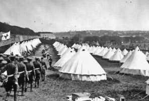 Troops return to their tents after training