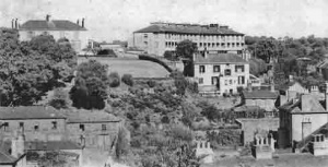 A picture captioned 'Town houses and villas and girls school', but which is the school?