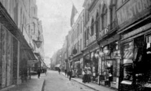 RM Stores, part of the Ready Money grocery store group, in the foreground on the right