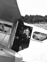 Charles Stevens emerges from the aircraft St Clement's Bay on the sands at West Park in 1934