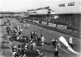 Cars lined up opposite the grandstand