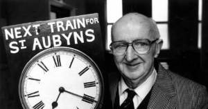 Arthur Le Masurier (80) in 1990 with Jersey Railway clock