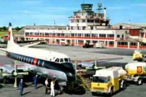 A Viscount in front of the airport buildings