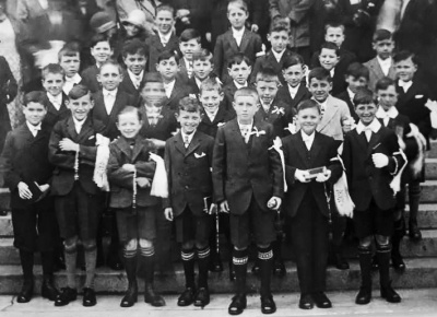 Maurice and Guy Buesnel are in this group of first communicants