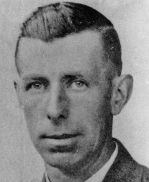 John Dingle, born on 14 August 1903, lived at 45 Clos du Parq, St. Helier, during the Occupation. Known to many as Jack, he was involved with air raid precautions, and volunteered as a dispatch rider with Victor Webb and Joe Miere. In the event of an air raid they would be able to lift their bicycles over rubble to distribute messages. On 23 November 1944 Jack was tried on a charge of failing to surrender a wireless set. He was sentenced to six months in prison, but was released on 31 March 1945. While in prison with Joe Miere, he suggested hanging a Union Jack on the cell door. The Prison Governor, Ernest Briard, attempted to make them take it down, but they resisted and Dingle threatened to hit anyone who tried to. General Wulf inspected the prison, and when he came across this flag he supposedly exclaimed in good English, 'These boys are British alright'