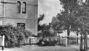 A train rounds the St Aubin terminus heading for Corbiere