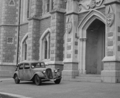 German car in front of the main entrance. This photograph was not taken during the Occupation but staged some time afterwards