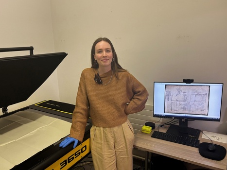 Shan uses the latest large-format scanner to digitise large plans