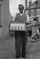 Gerald Ernest Michel (1912-1987), son of Fred, with the dairy's first bottled milk