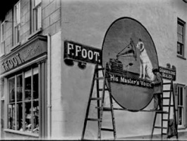 The sign being painted
