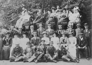 A large group pauses for a photograph during an outing