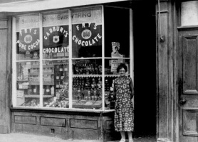 Mabel Skingle outside the family shop in Ann Street in the 1930s