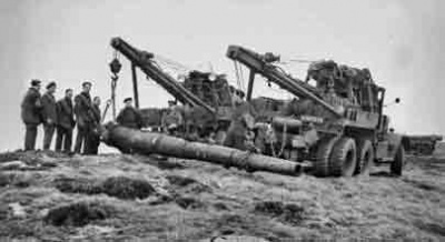 German guns are dumped over the cliff at Les Landes in 1946. Some were recovered some later
