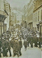 Garrison soldiers march down Pier Road from Fort Regent on their way to church parade