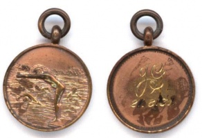 A medal won by Jean in 1931 ...