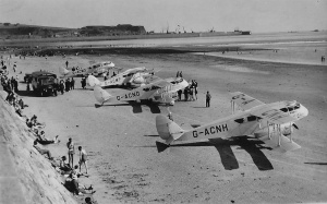 Four DH84 Dragons on the beach at West Park